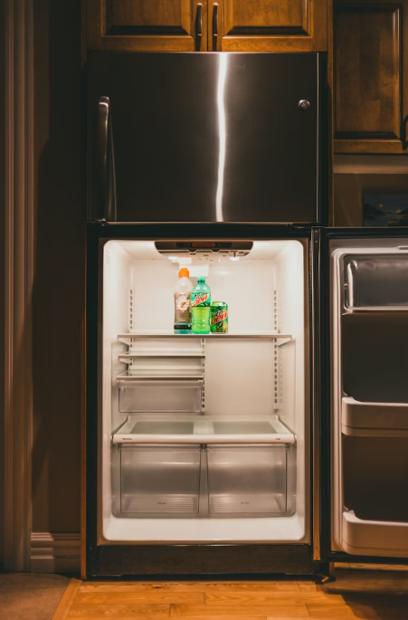 This image shows an open refrigerator.